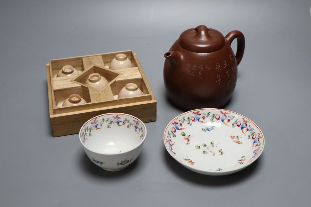 A Japanese Ko Satsuma Chawan, 18th century, a Newhall tea bowl and saucer and a Yixing style redware teapot,
